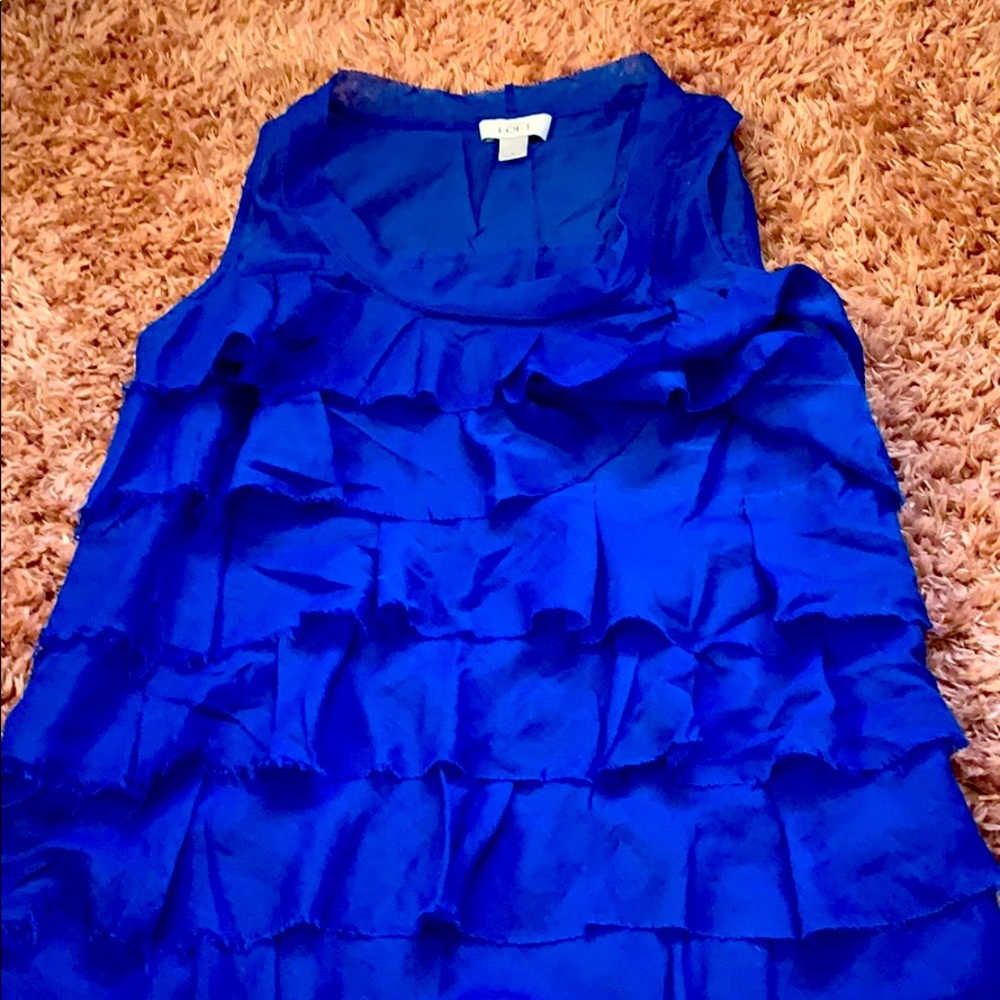 blue ruffled blouse